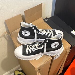 Converse women’s Black and White High-Top Sneakers